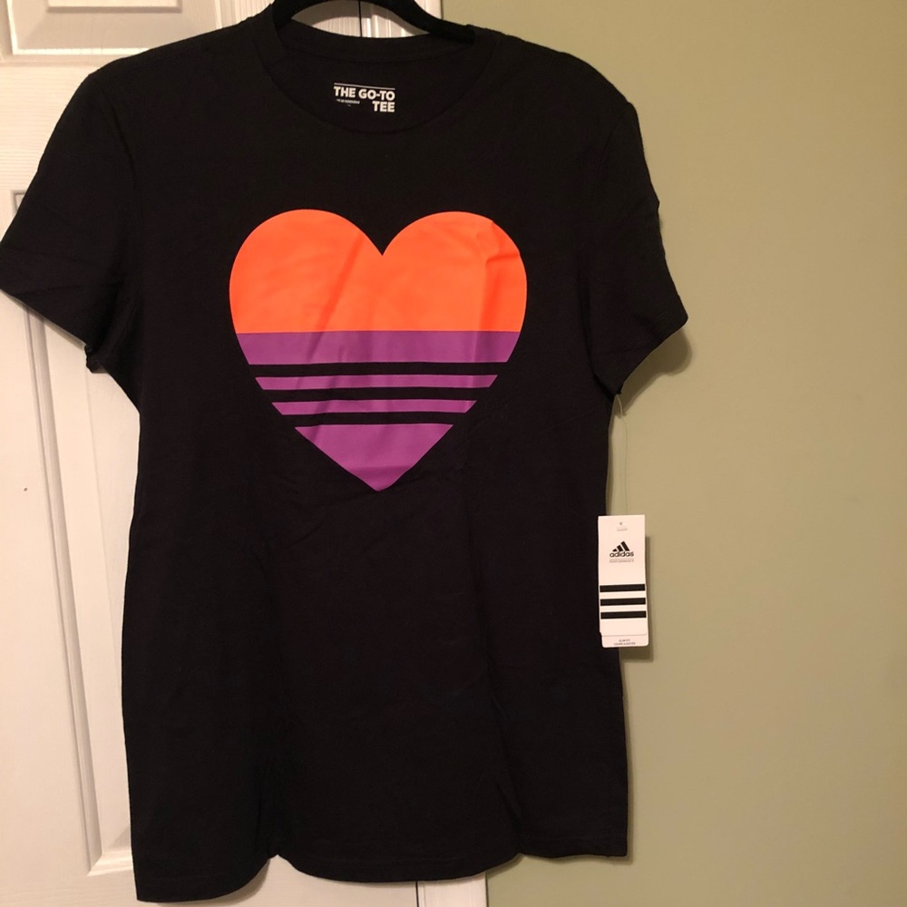 Adidas women’s T-shirt. It is NWT, size large.